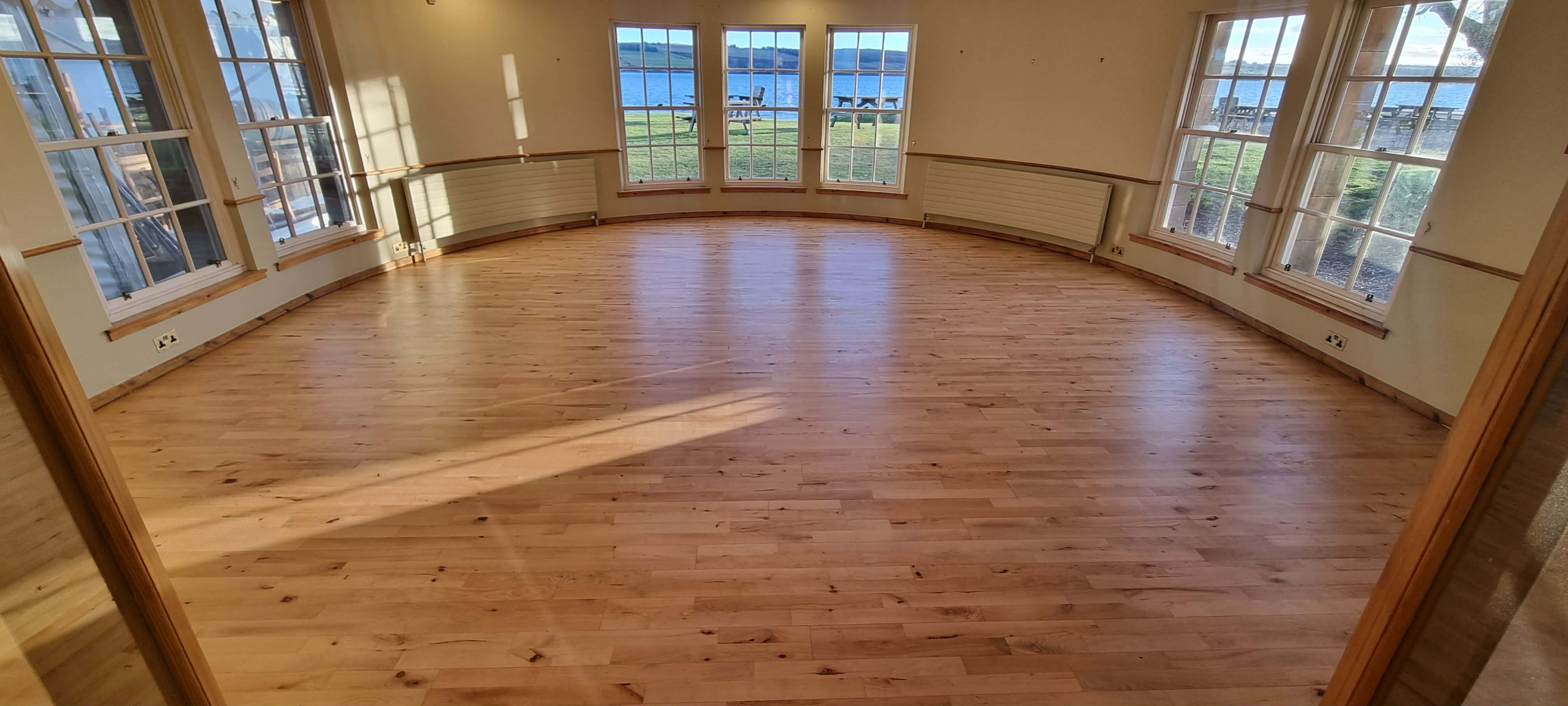 Floor sanding process in action